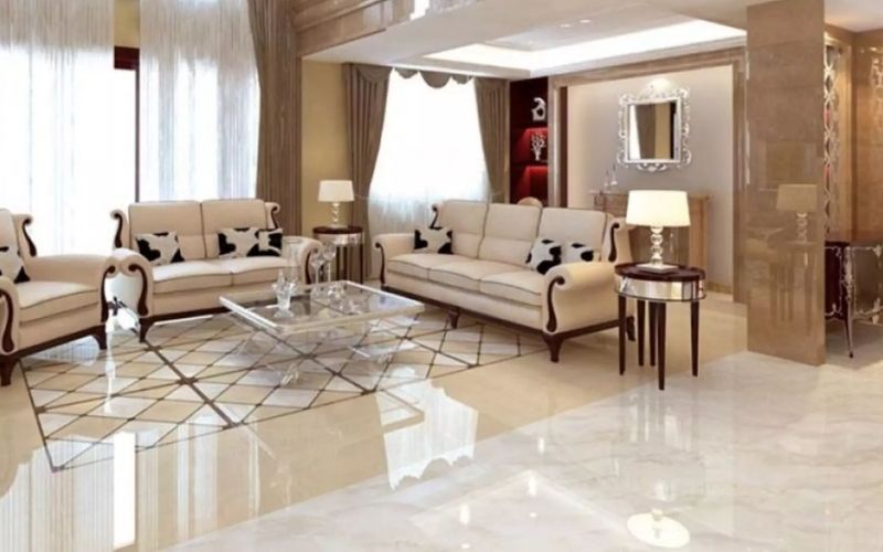 Mẫu gạch thảm với họa tiết các hình chéo cắt nhau làm nổi bật ở trung tâm. Màu sắc phối hợp tông vàng nhạt - trắng tạo sự hài hòa và tăng thêm độ sáng cho khu vực phòng khách.