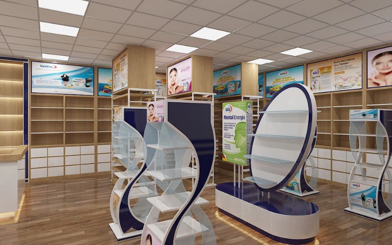 Thiết kế cửa hàng thuốc tây đẹp có không gian rộng với màu vàng nhẹ của gỗ, hệ thống kệ trưng bày đa dạng giúp tạo sự hài hòa cho kiến trúc. Tùy vào từng loại sản phẩm mà bạn nên lựa chọn khung kệ trưng bày phù hợp và hình ảnh minh họa để thu hút thị hiếu khách hàng.