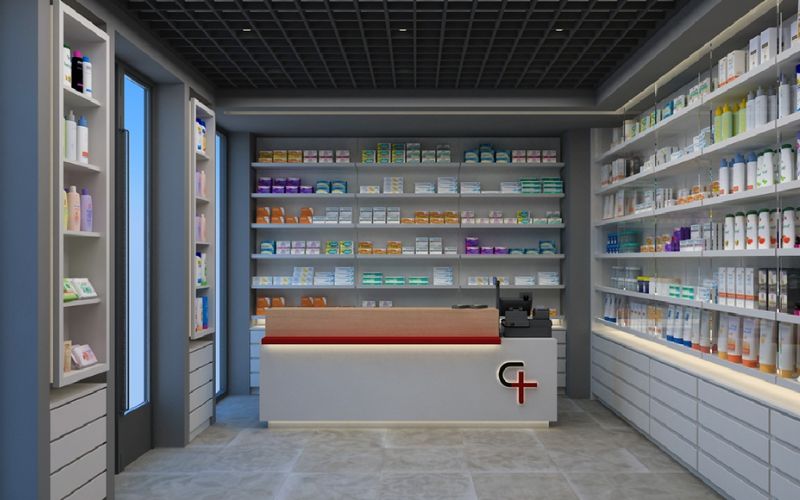 Thiết kế quầy thuốc đẹp với gam màu xám chủ đạo kết hợp hệ thống kệ tủ trưng bày màu trắng tinh tế tạo nên tổng thể hài hòa và vô cùng hiện đại.