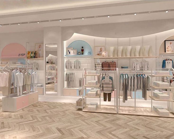 Phong cách hiện đại: Một mẫu thiết kế shop quần áo trẻ em đơn giản nhưng không kém phần sang trọng. Thiết kế ưu tiên dùng kệ có thiết kế nhỏ gọn, ôm tường để tạo không gian rộng và thuận tiện cho khách hàng khi lựa chọn.